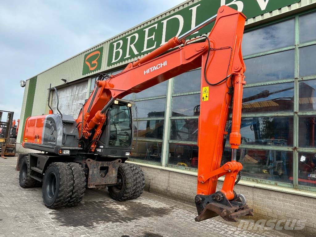 Hitachi ZX 140 W-3 حفارات بعجل