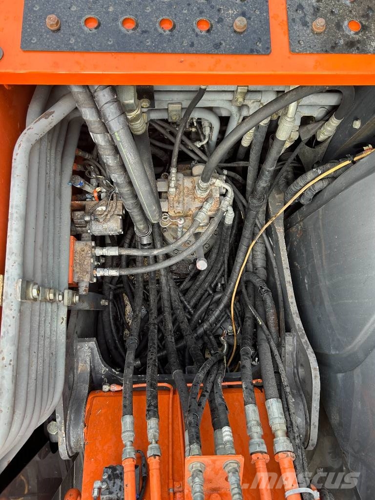 Hitachi ZX 140 W-3 حفارات بعجل