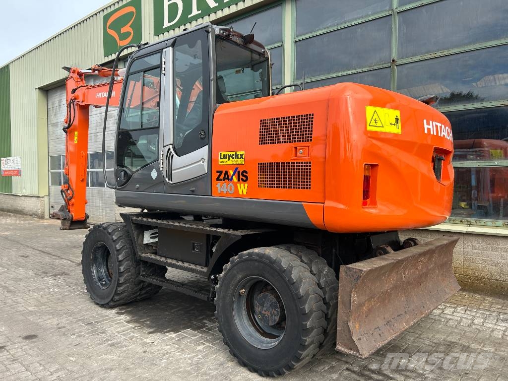 Hitachi ZX 140 W-3 حفارات بعجل