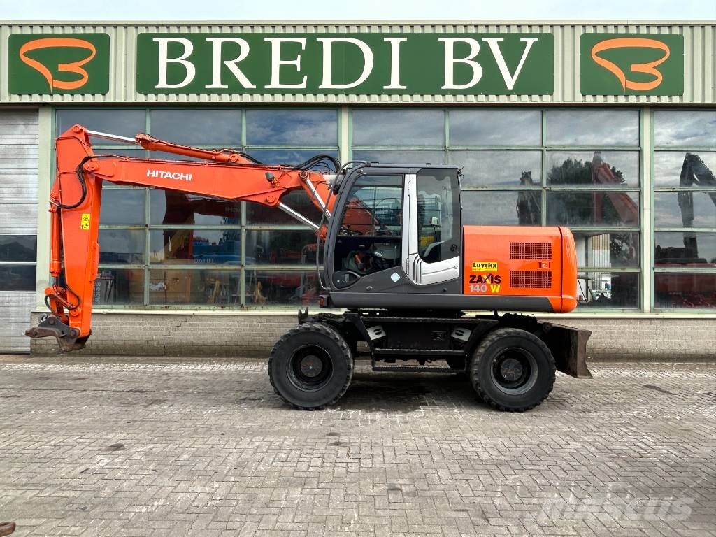 Hitachi ZX 140 W-3 حفارات بعجل