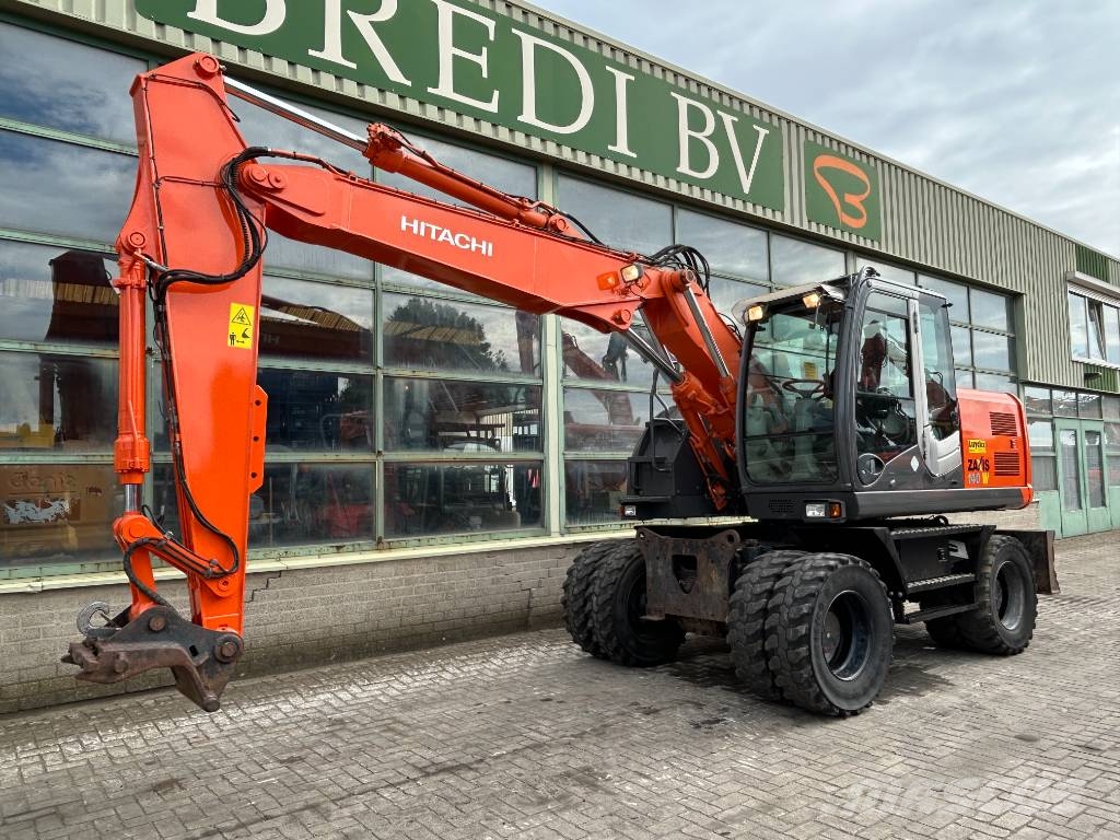 Hitachi ZX 140 W-3 حفارات بعجل