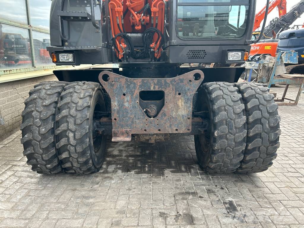 Hitachi ZX 140 W-3 حفارات بعجل