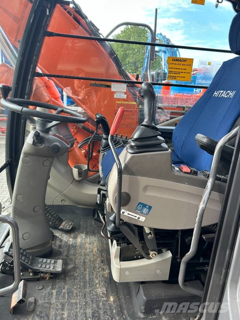 Hitachi ZX 140 W-3 حفارات بعجل