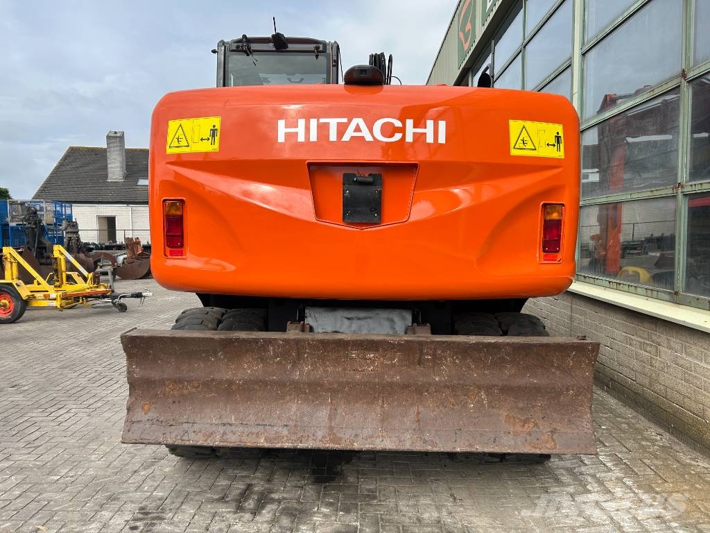 Hitachi ZX 140 W-3 حفارات بعجل