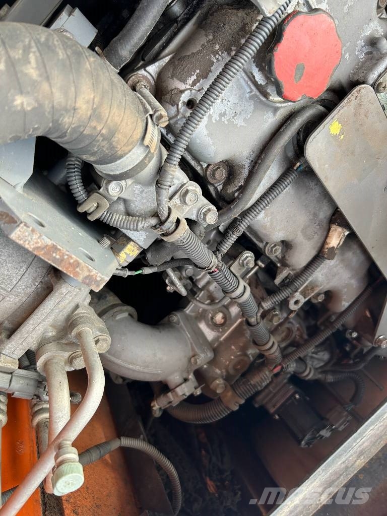 Hitachi ZX 140 W-3 حفارات بعجل