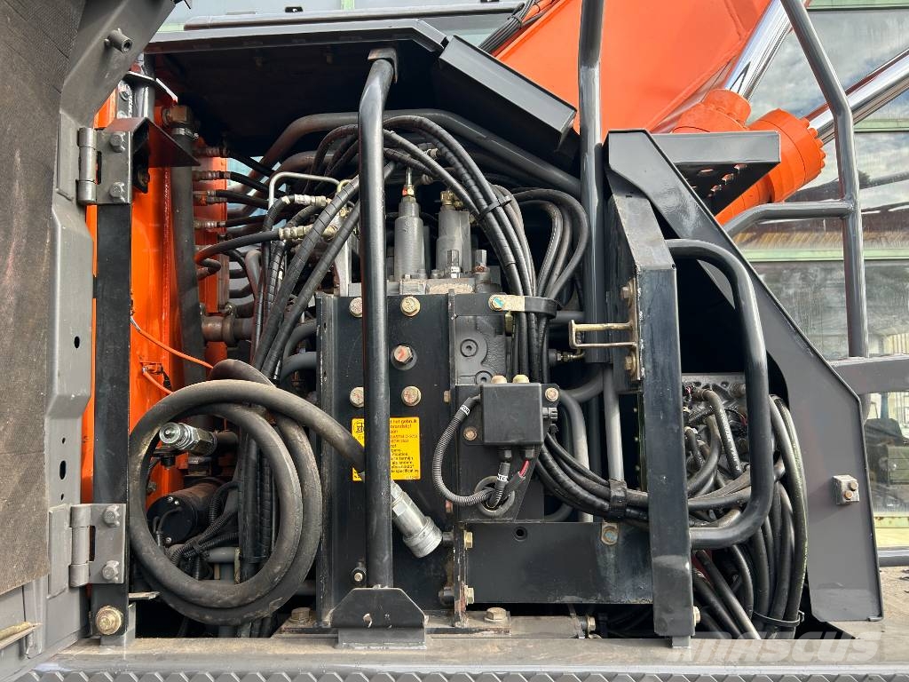 Hitachi ZX 140 W-3 حفارات بعجل