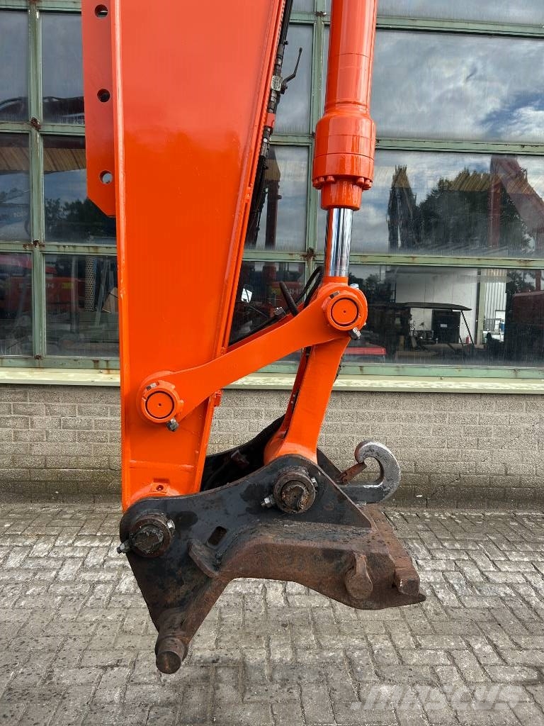 Hitachi ZX 140 W-3 حفارات بعجل