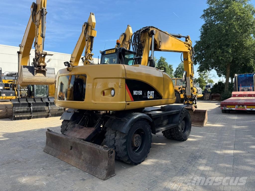 CAT M315D Minigraafmachines < 7t