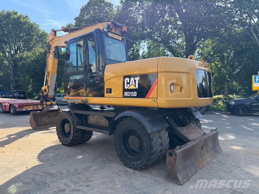 CAT M315D Minigraafmachines < 7t
