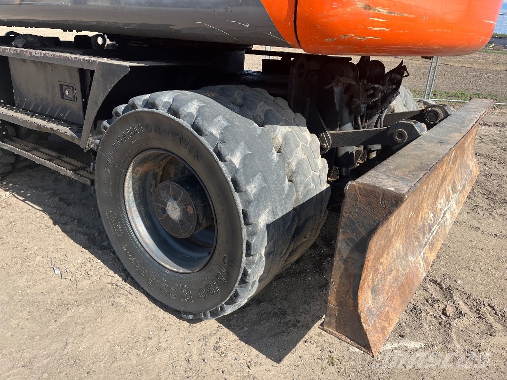 Hitachi ZX 140 W-3 Gumikerekes kotrók