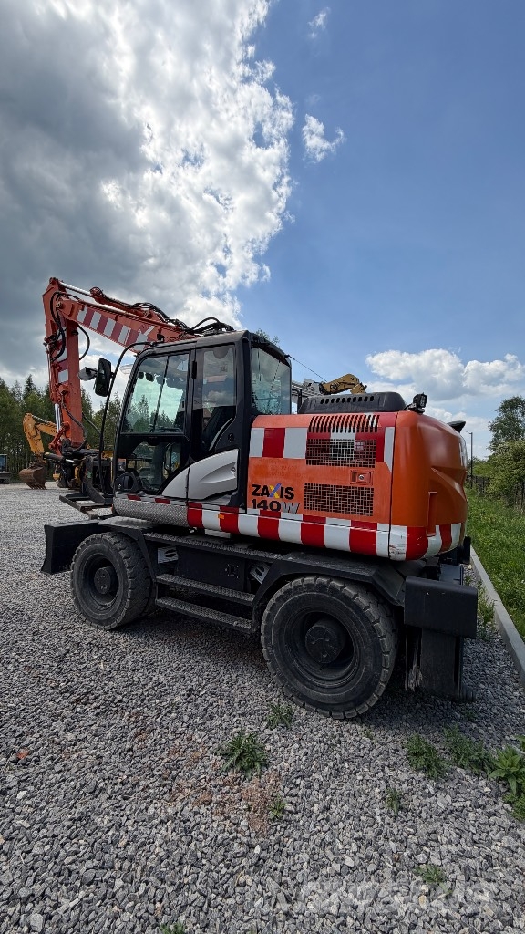 Hitachi Sumitomo ZX 140W-5B حفارات بعجل