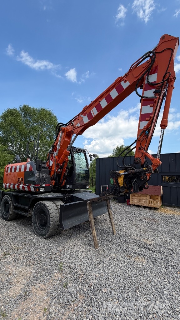 Hitachi Sumitomo ZX 140W-5B حفارات بعجل