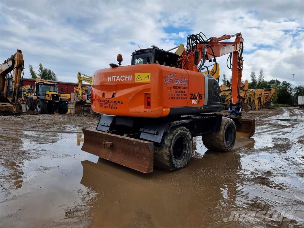 Hitachi ZX 140 W-3 حفارات بعجل