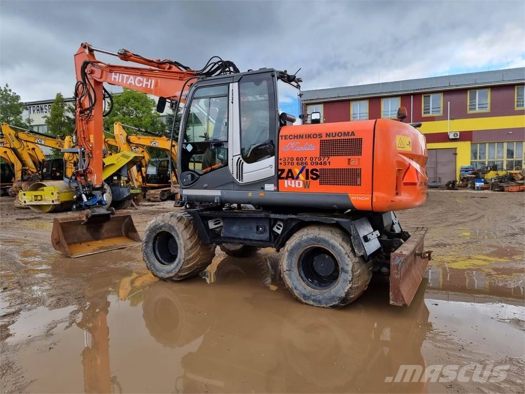 Hitachi ZX 140 W-3 حفارات بعجل