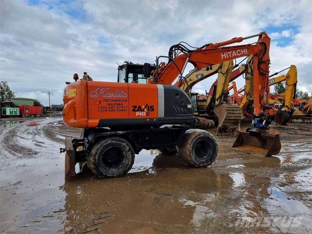 Hitachi ZX 140 W-3 حفارات بعجل