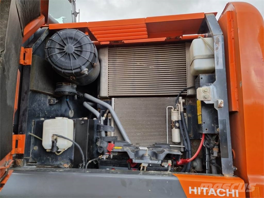 Hitachi ZX 140 W-3 حفارات بعجل