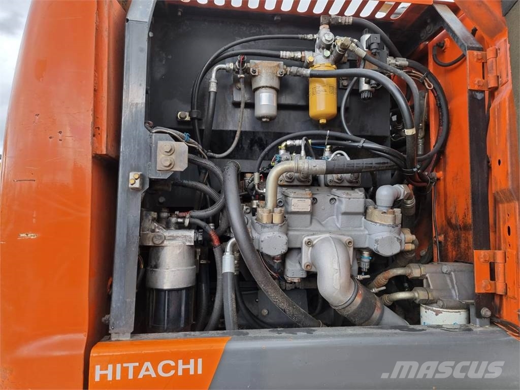 Hitachi ZX 140 W-3 حفارات بعجل