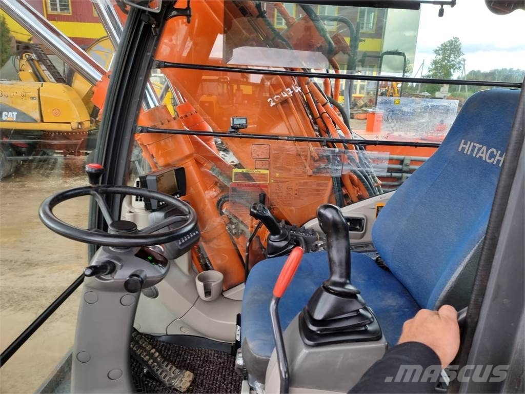 Hitachi ZX 140 W-3 حفارات بعجل