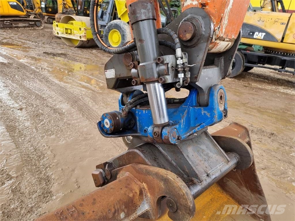 Hitachi ZX 140 W-3 حفارات بعجل