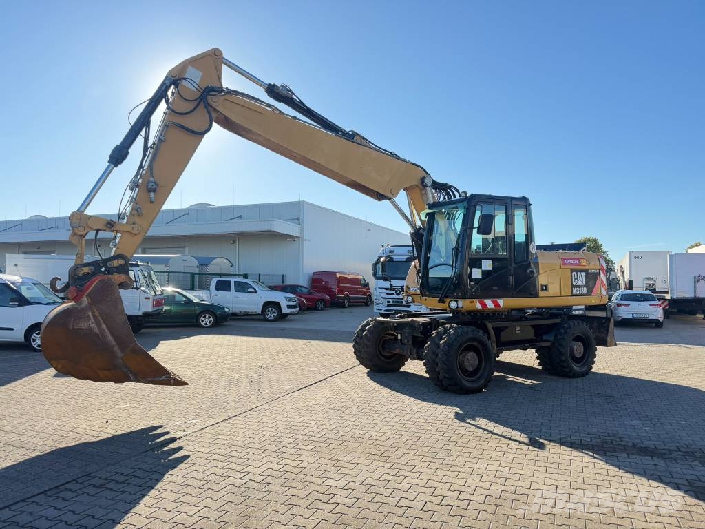 CAT M 318 D 18,3t*Klima*Löffel*Allrad*ReifenNeu*1.Hand Escavadeiras de rodas