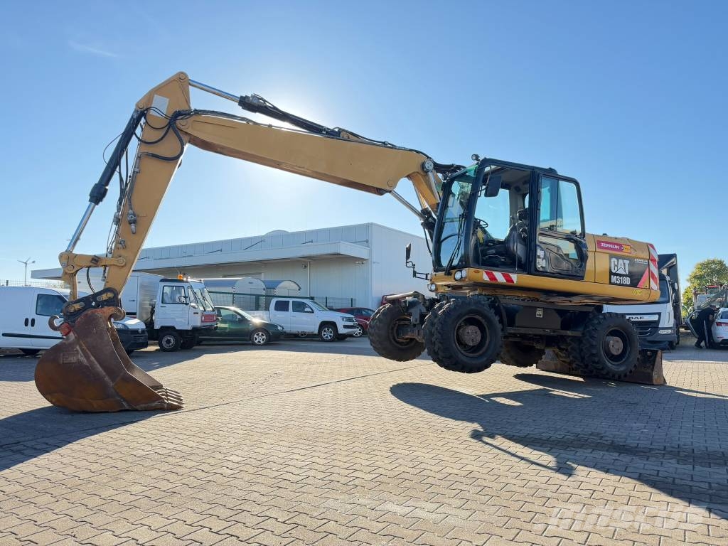 CAT M 318 D 18,3t*Klima*Löffel*Allrad*ReifenNeu*1.Hand Escavadeiras de rodas