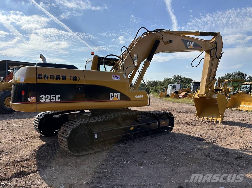 CAT 325 Гусеничні екскаватори