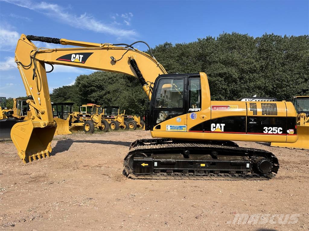 CAT 325 Гусеничні екскаватори