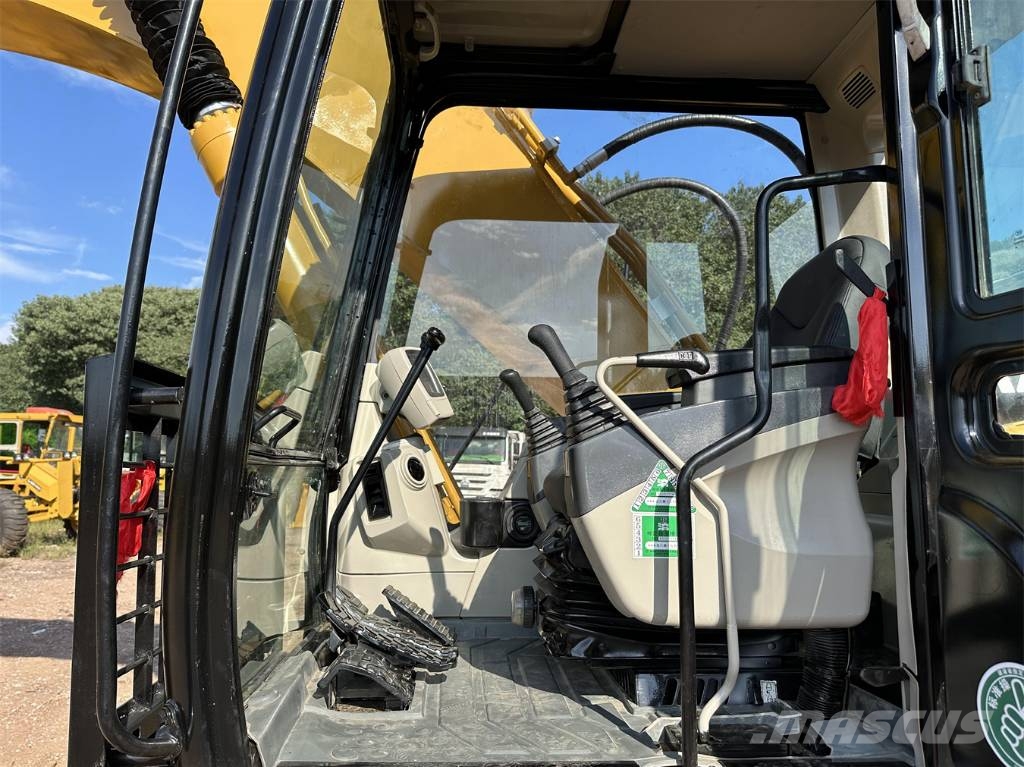 CAT 325 Гусеничні екскаватори