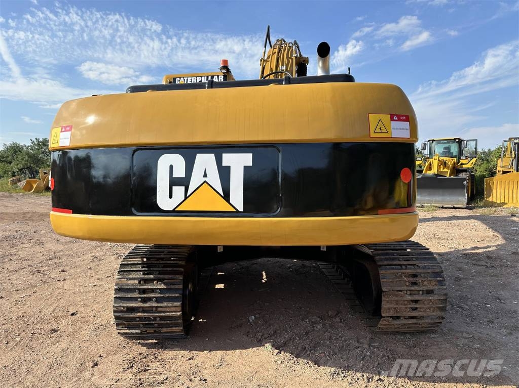 CAT 325 Гусеничні екскаватори