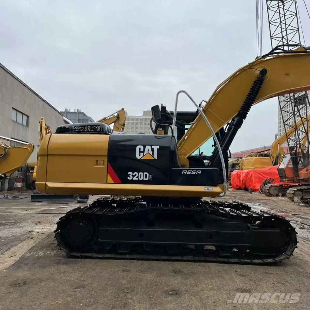 CAT 323D2 Gravemaskiner på larvebånd