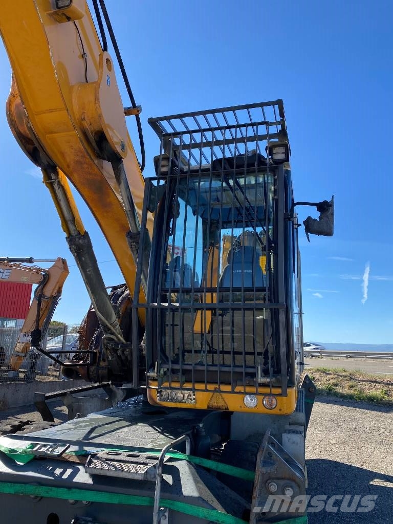Liebherr LH 26 M Industry-Litronic endommagée Pelle sur pneus