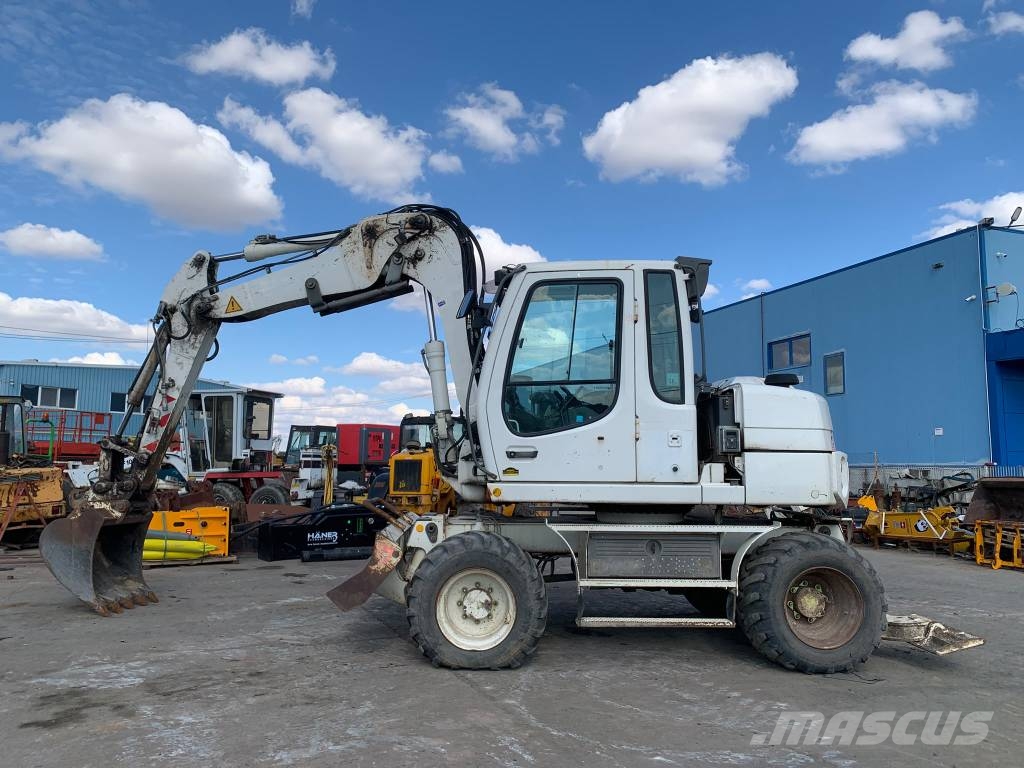 Liebherr A 311 Litronic Bageri točkaši