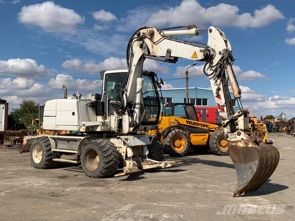Liebherr A 311 Litronic Bageri točkaši