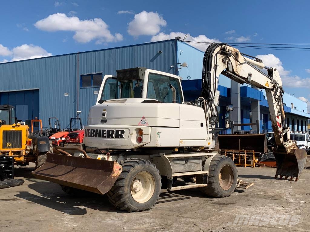 Liebherr A 311 Litronic Bageri točkaši