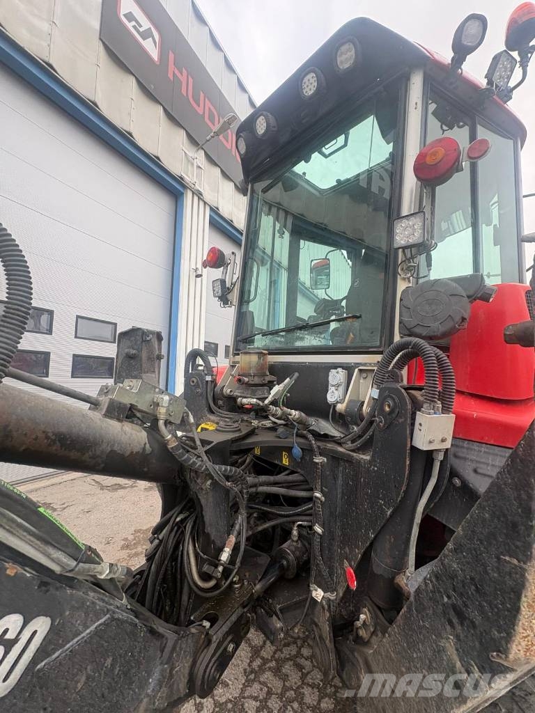 Huddig perfekt gårdsmaskin 1060 Tractopelle