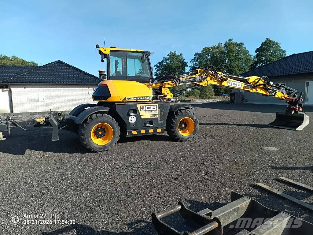JCB 110 W Hydradig med vagn och mycket redskap Wielgraafmachines