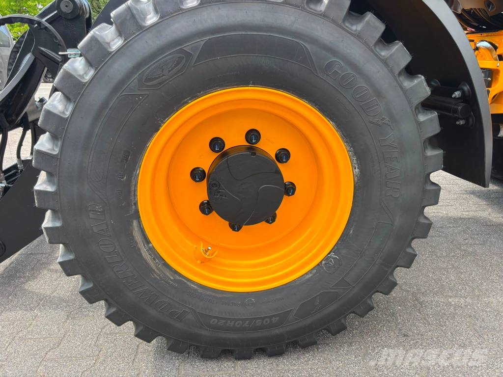 JCB 409 لوادر بعجل