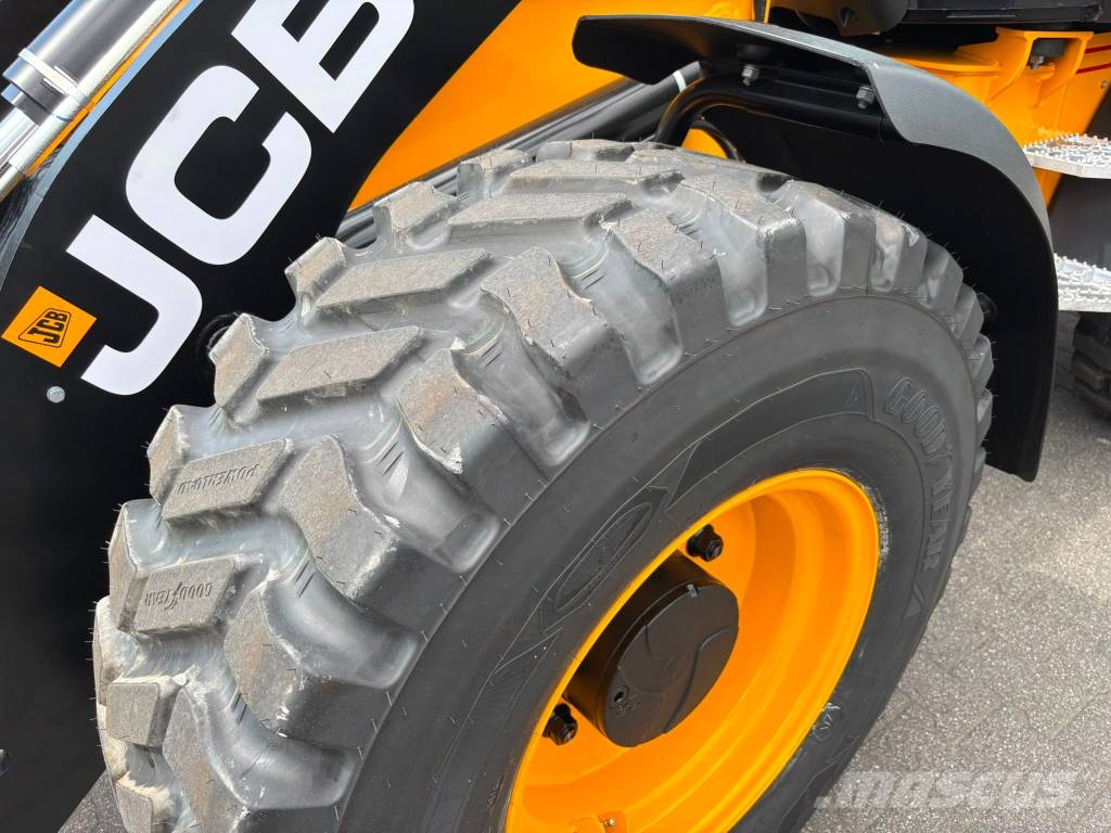 JCB 409 لوادر بعجل