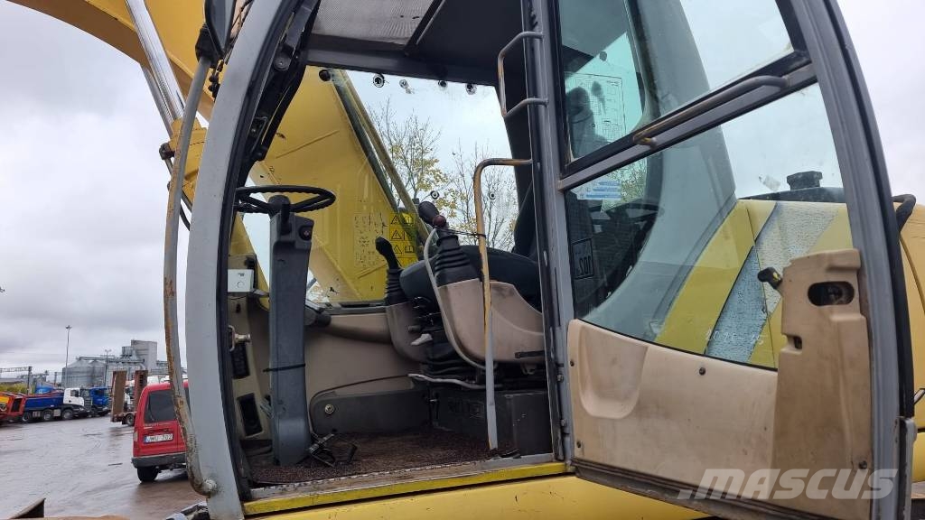 New Holland MH City Ratiniai ekskavatoriai