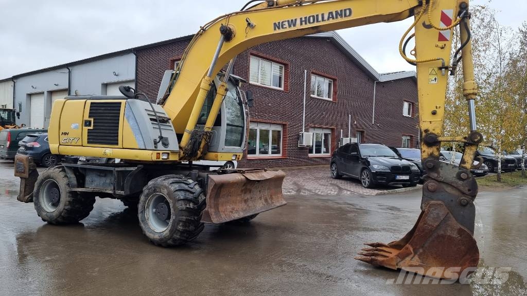 New Holland MH City Ratiniai ekskavatoriai