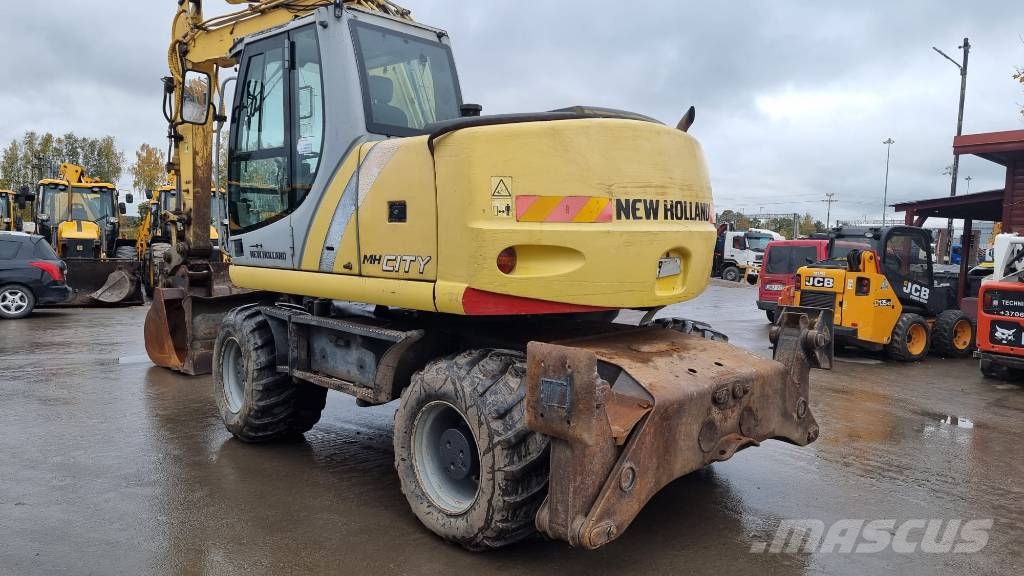 New Holland MH City Ratiniai ekskavatoriai