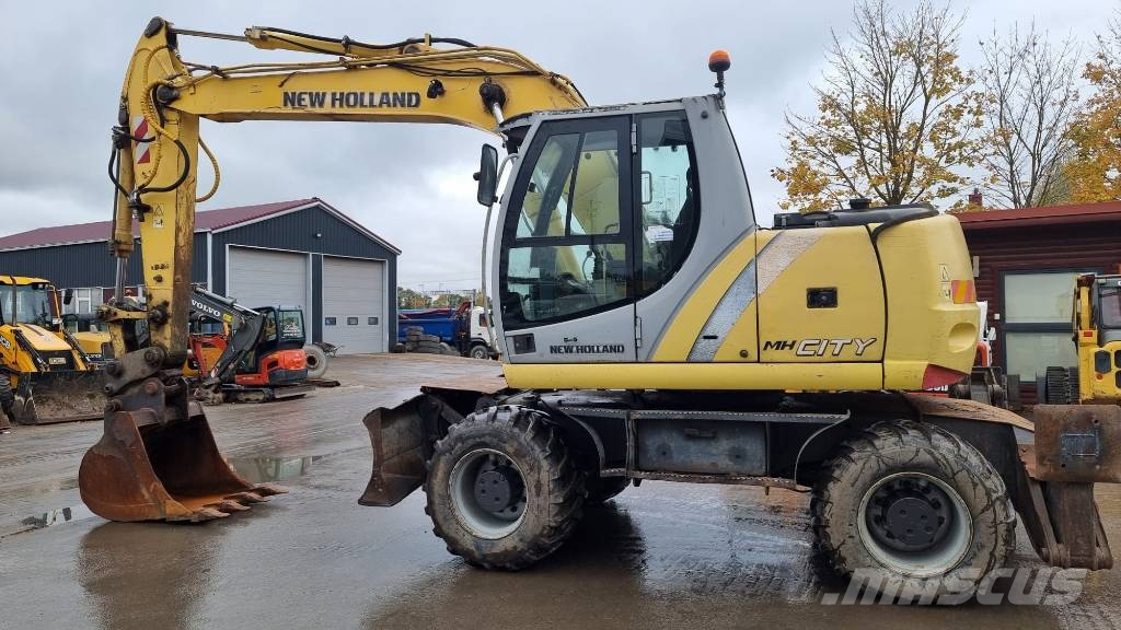 New Holland MH City Ratiniai ekskavatoriai