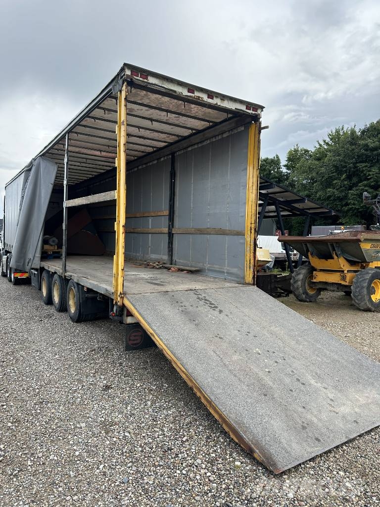 Schmitz Machine transport trailer with big ramp Autotransporter