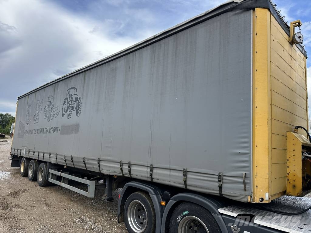 Schmitz Machine transport trailer with big ramp Autotransporter