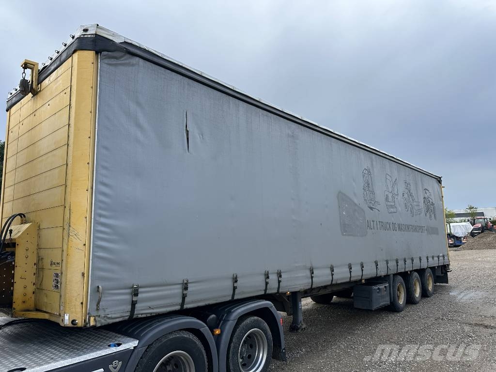 Schmitz Machine transport trailer with big ramp Autotransporter