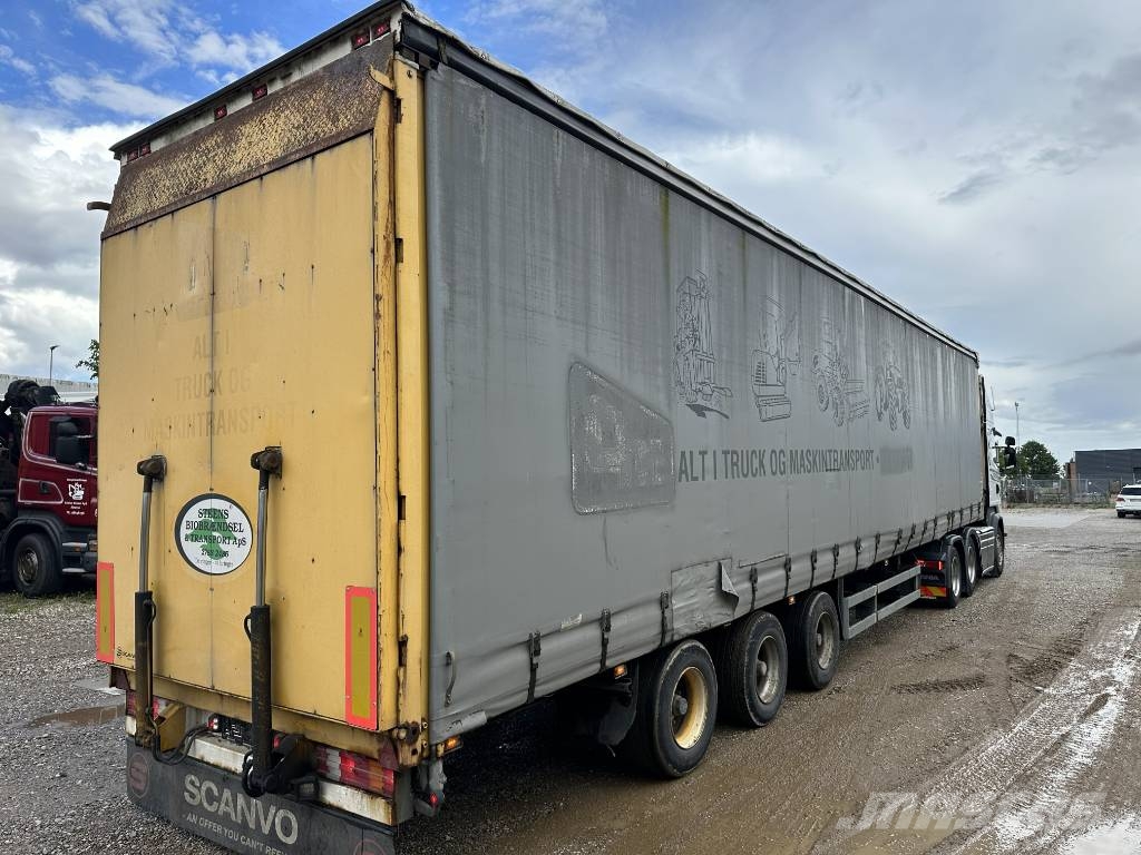 Schmitz Machine transport trailer with big ramp Autotransporter