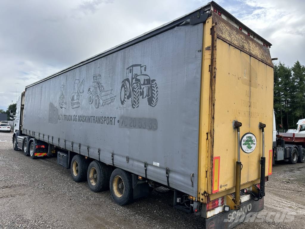 Schmitz Machine transport trailer with big ramp Autotransporter