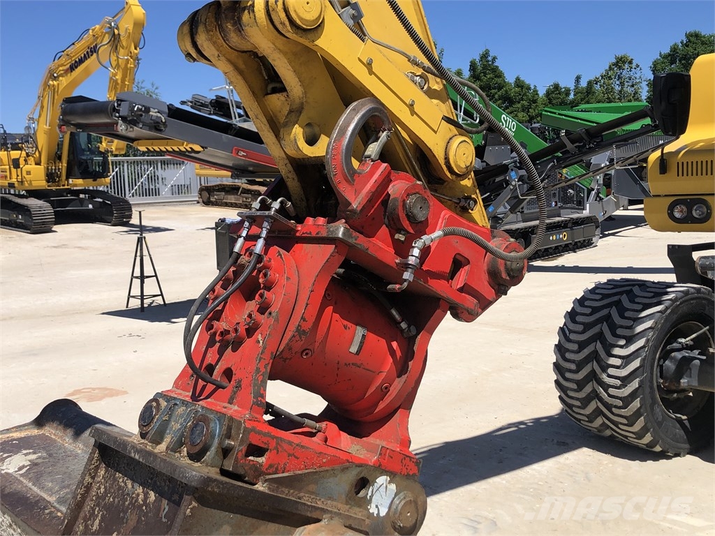 Komatsu PW 180-11 Lastik tekerli ekskavatörler