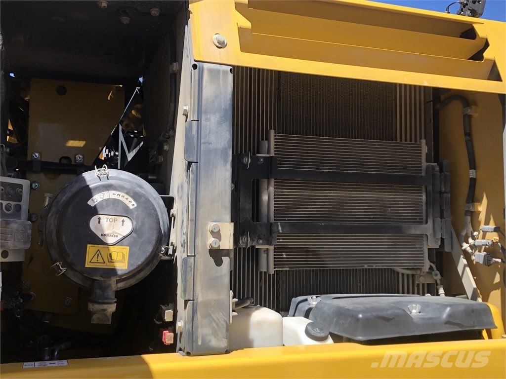 Komatsu PW 180-11 Lastik tekerli ekskavatörler