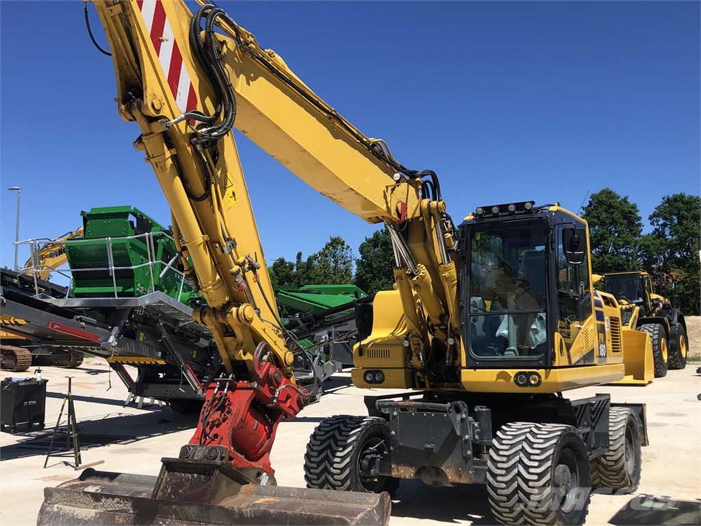 Komatsu PW 180-11 Lastik tekerli ekskavatörler